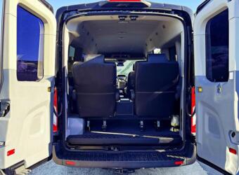  is perfect for adventure. It's parked on pavement with a scenic outdoor background.|Inside this spacious RV rental — photo 6