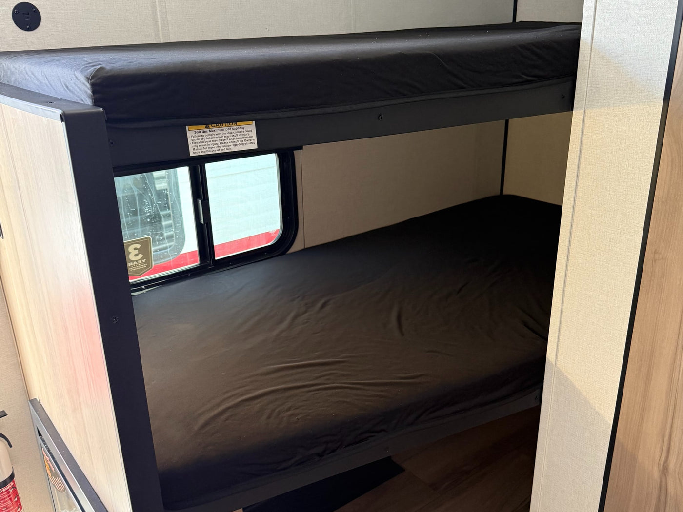  awaits.|This white and silver Coleman travel trailer — photo 5