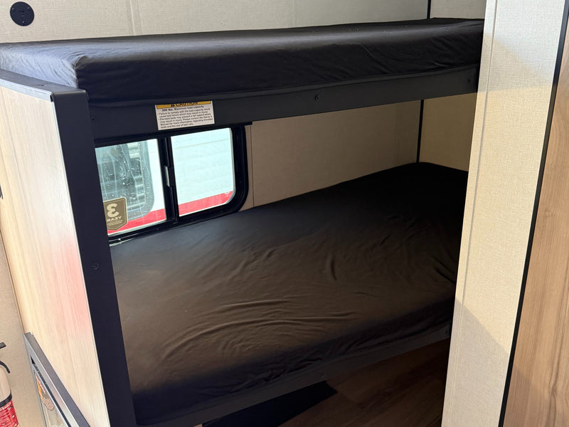  awaits.|This white and silver Coleman travel trailer — photo 5
