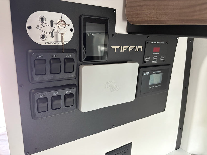 RV rental control panel: view tank levels, operate bed lift, lights, & monitor systems for a smooth ride. — photo 8