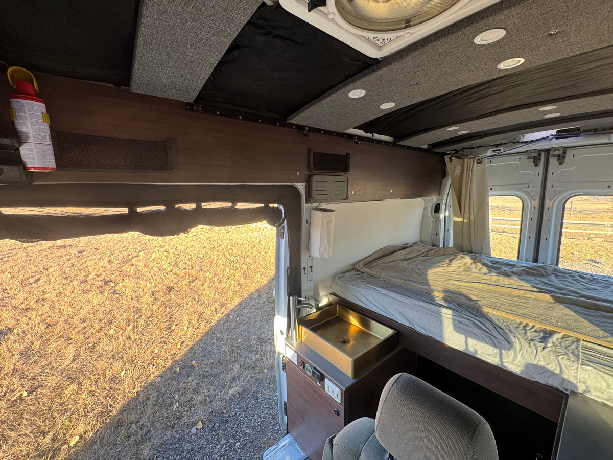  ready for adventure trips.|Inside this RV rental camper van — photo 15