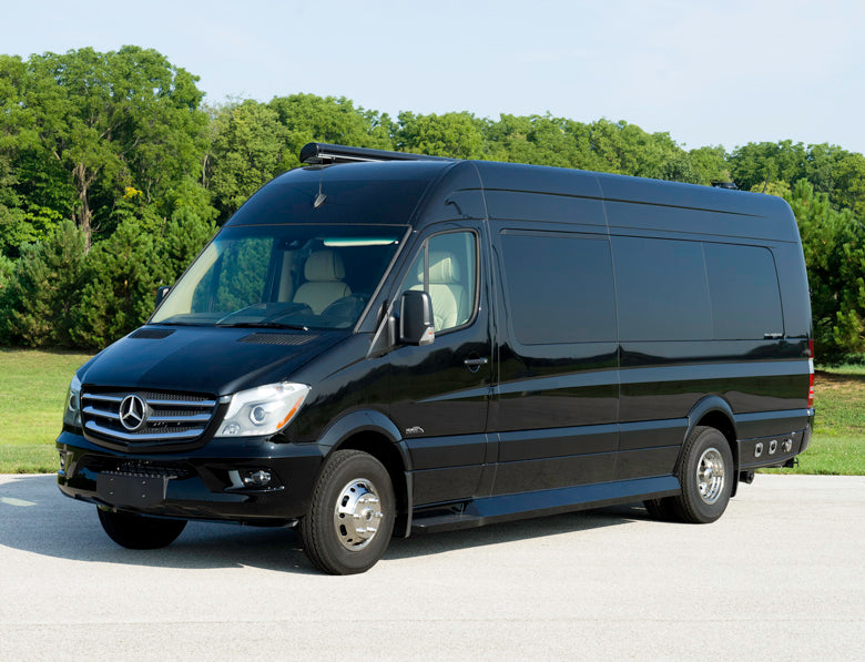 This sleek black Mercedes-Benz Sprinter van, ideal for rv rental, is a luxury camper van ready for travel. — photo 10