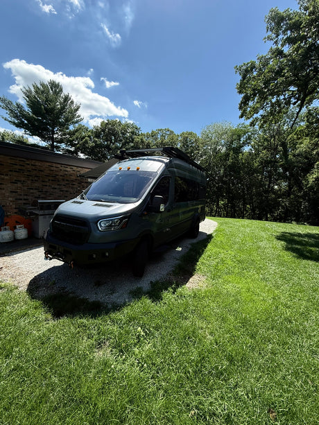 featuring an extended awning and roof rack