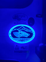 Illuminated "Black Label" wolf logo and "Forest River 16BHSBL" on an RV interior wall, perfect for your next RV rental.