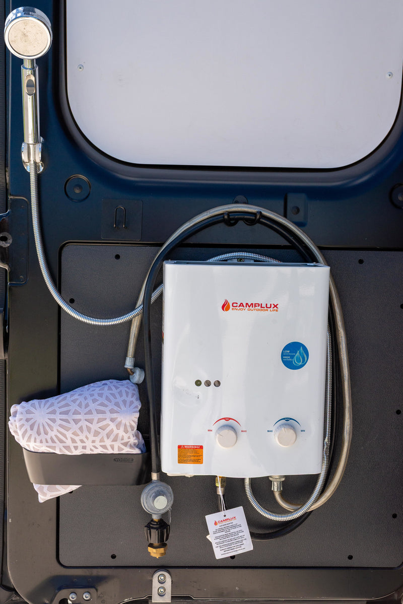RV rental equipped with a portable Camplux water heater and outdoor shower for convenient hot water on the go. — photo 18