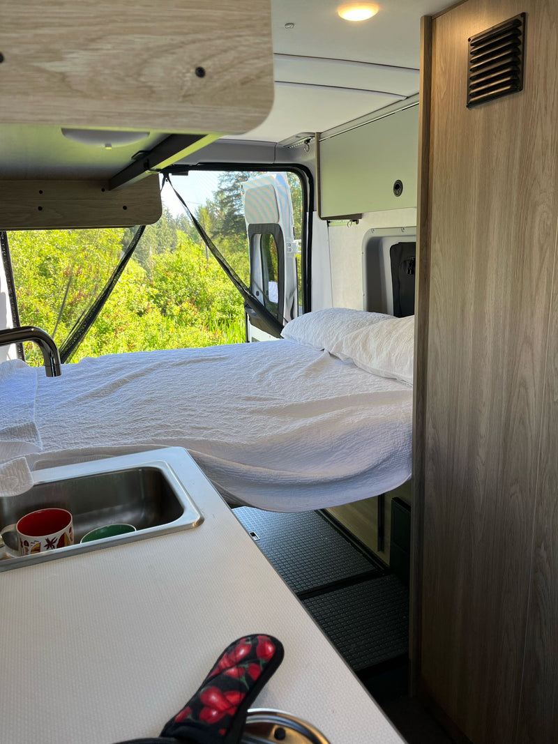  perfect for camping cooking.|Inside an RV rental: a compact wet bath with a toilet — photo 12