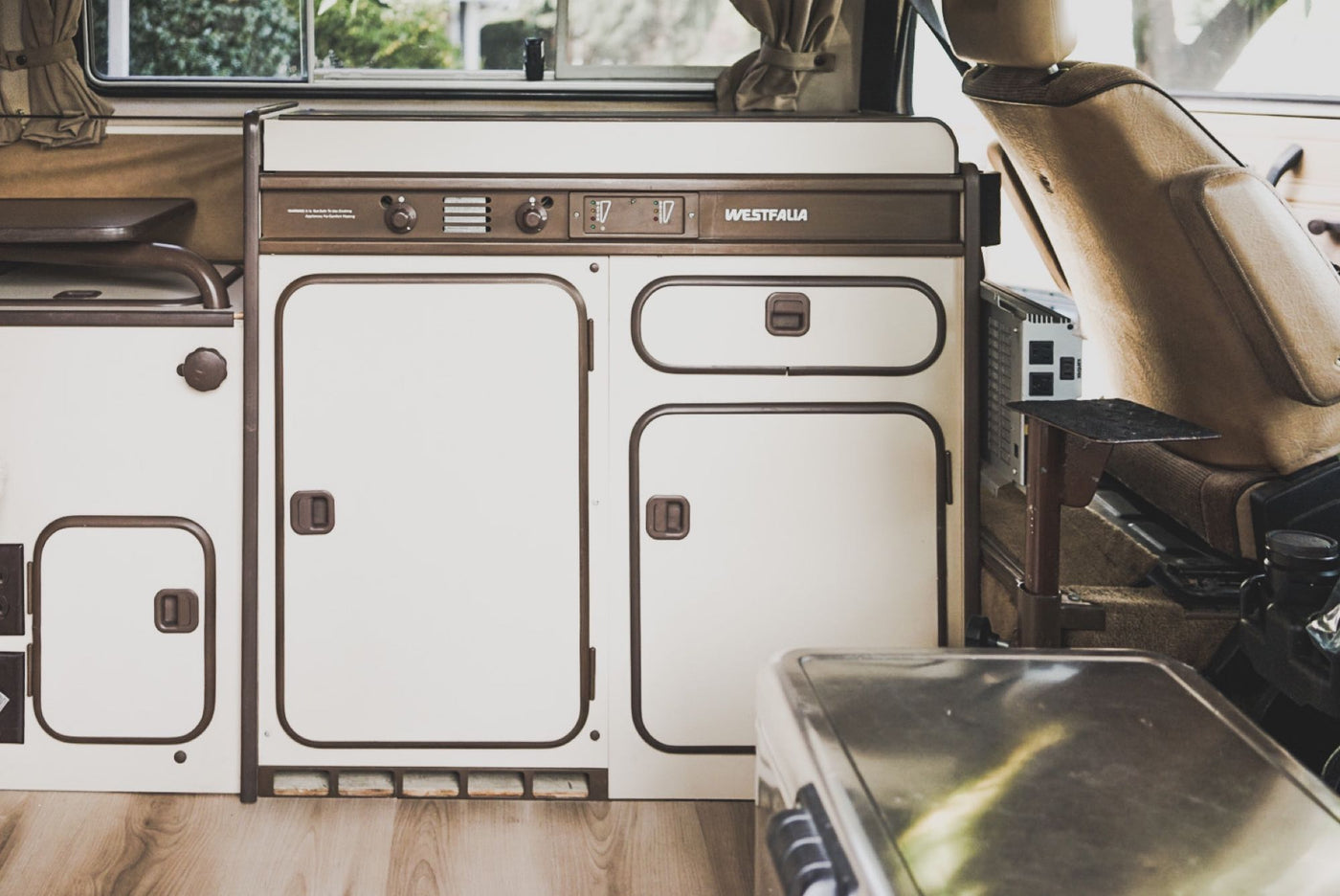 ideal for an RV rental getaway.|Experience van life with this RV rental! Interior view of a classic camper with kitchen — photo 14