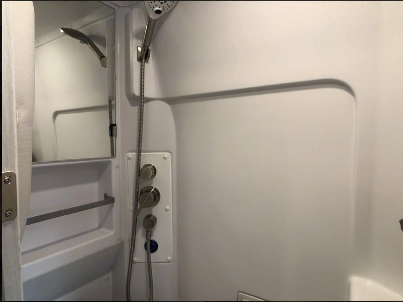  and large infotainment screen.|Sleek silver camper van — photo 9