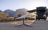 A Starlink dish provides internet for an RV rental, parked in a remote, scenic mountain setting.