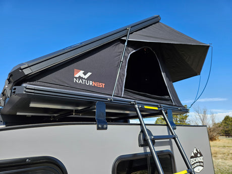 Rooftop tent on an Escapade camper. This NaturNest setup offers a unique RV rental for outdoor adventures.