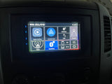 Inside an **RV rental**: **Boss Elite** infotainment system showing **Apple CarPlay**, **Android Auto**, and other **media options**.