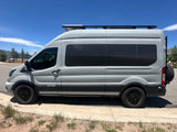 Modern gray Vandoit camper van, equipped for adventure, parked outside on a sunny day. Ideal for your next RV rental trip.