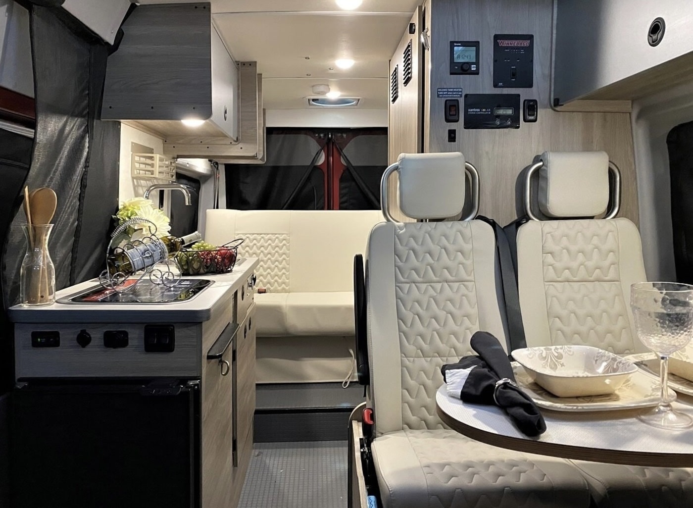  and a rear bed area.|Explore your RV rental's pop-top sleeping area — photo 4