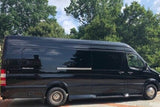 Side view of a black Mercedes-Benz Sprinter van. A versatile vehicle, perfect for luxury travel or an rv rental.