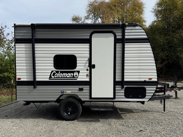 This small Coleman travel trailer RV rental features an awning
