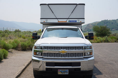 2021 Hawk Four Wheel Camper on Chevy Silverado — photo 2