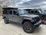 Adventure-ready Jeep Gladiator Rubicon with iKamper rooftop tent, ideal for rv rental and overlanding trips.