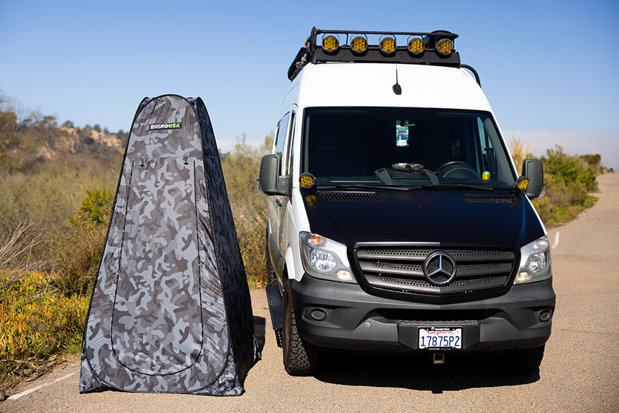 RV rental with a portable privacy tent for outdoor adventures. Perfect for camping trips.