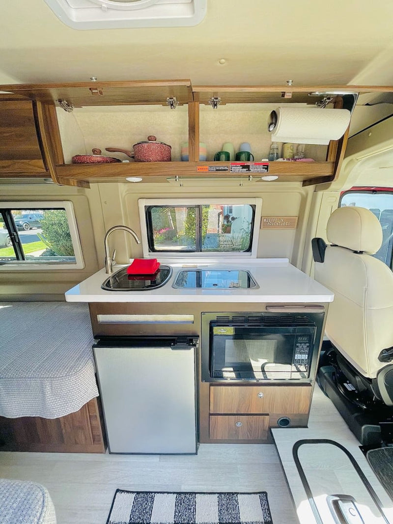  and a fire pit.|Explore this rv rental's compact interior: shower/toilet — photo 6