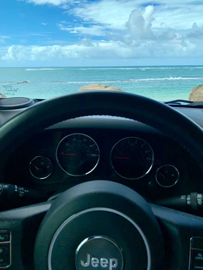 Jeep interior overlooking ocean. A perfect rental trip awaits, alongside rv rental options.