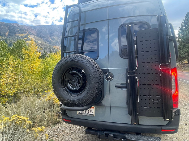  perfect for adventure.|Rear view of a camper van with a Roofnest rooftop tent & camera. Great for an rv rental adventure!|RV rental van with open back — photo 13