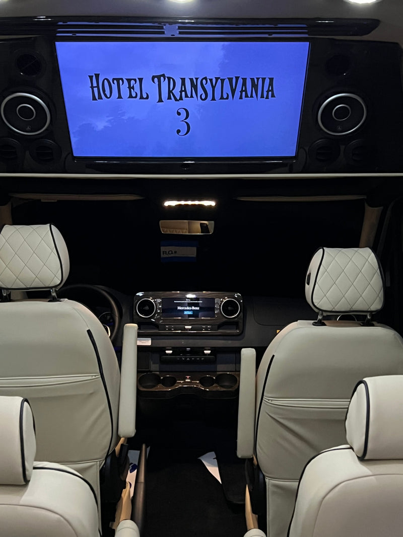 An RV rental interior with a large screen showing "Hotel Transylvania 3," providing mobile entertainment in comfort. — photo 15