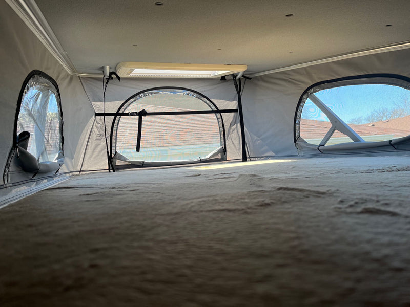  with a kitchen counter and seating visible below.|Soft — photo 9