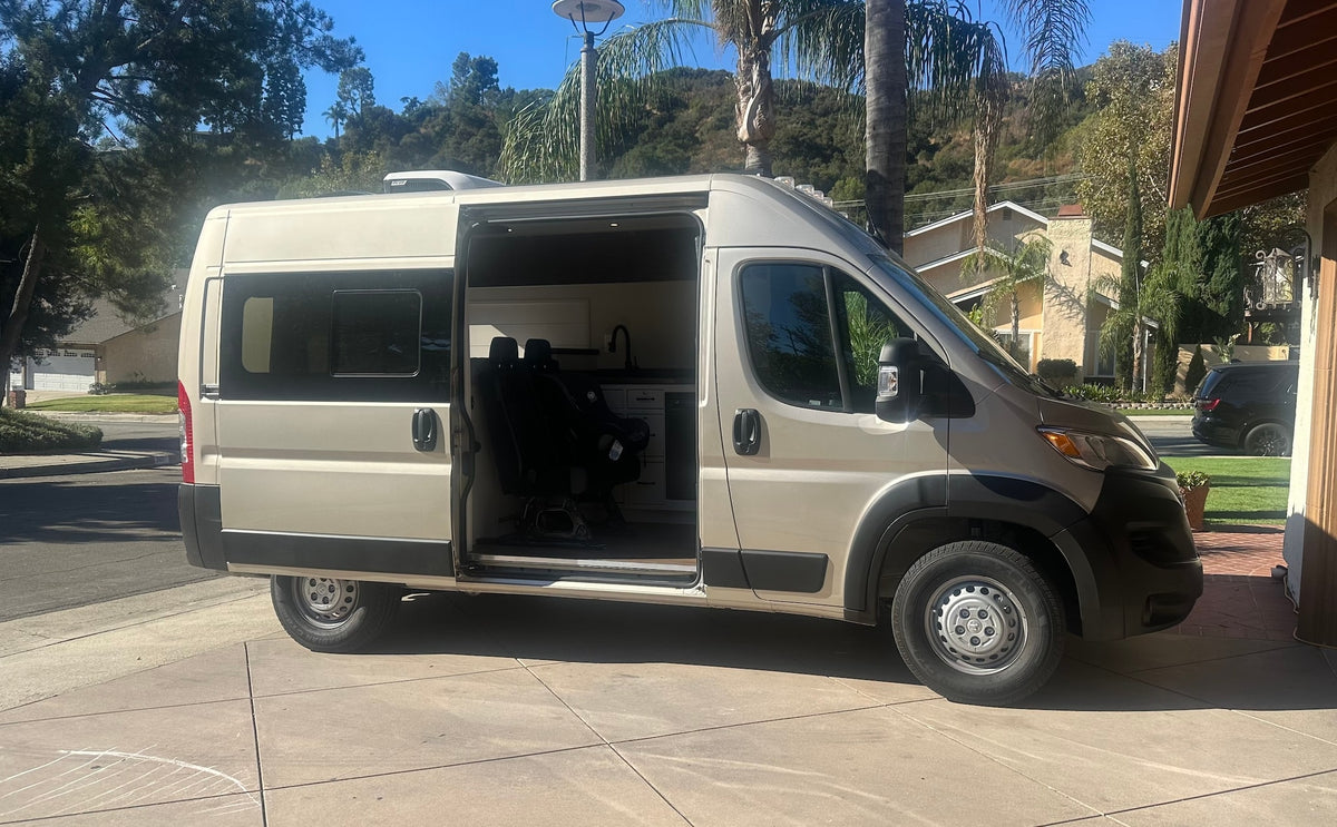 A modern beige camper van for rv rental
