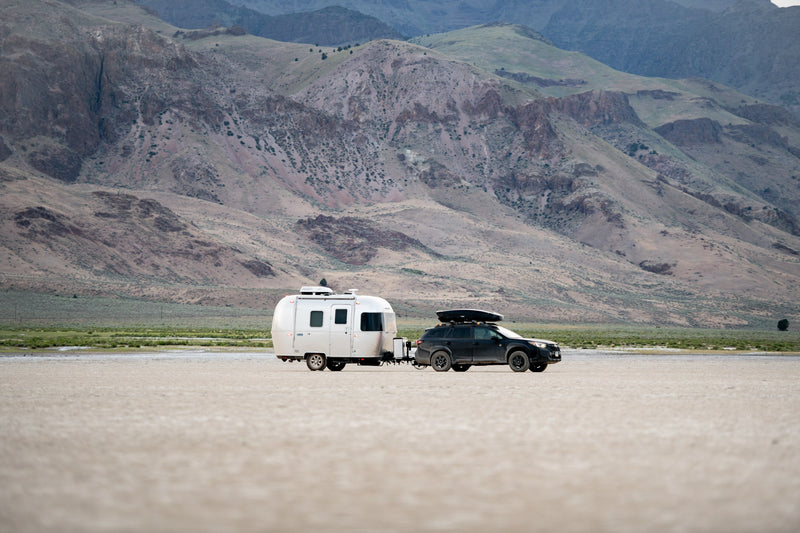  and dinette area visible for comfortable living.|Modern RV rental interior with a bright dinette setup — photo 4