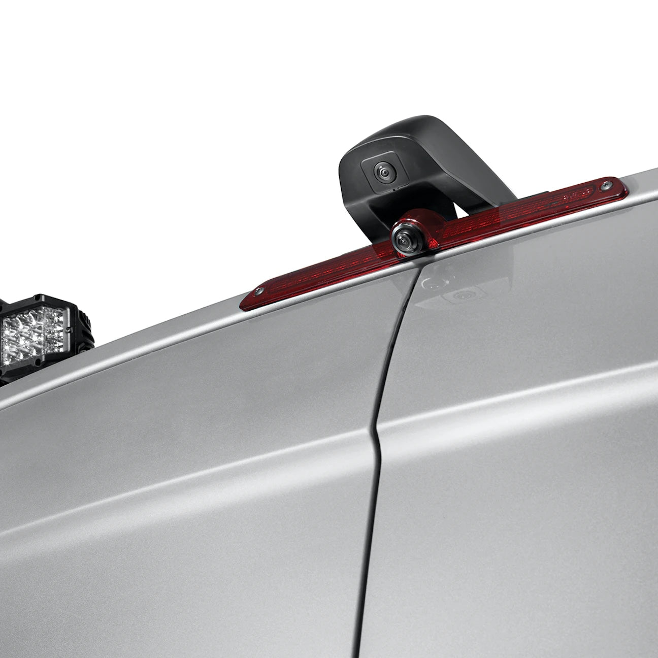 Upper view of silver RV rental: rear-facing camera, third brake light, and auxiliary lights for enhanced safety and monitoring.