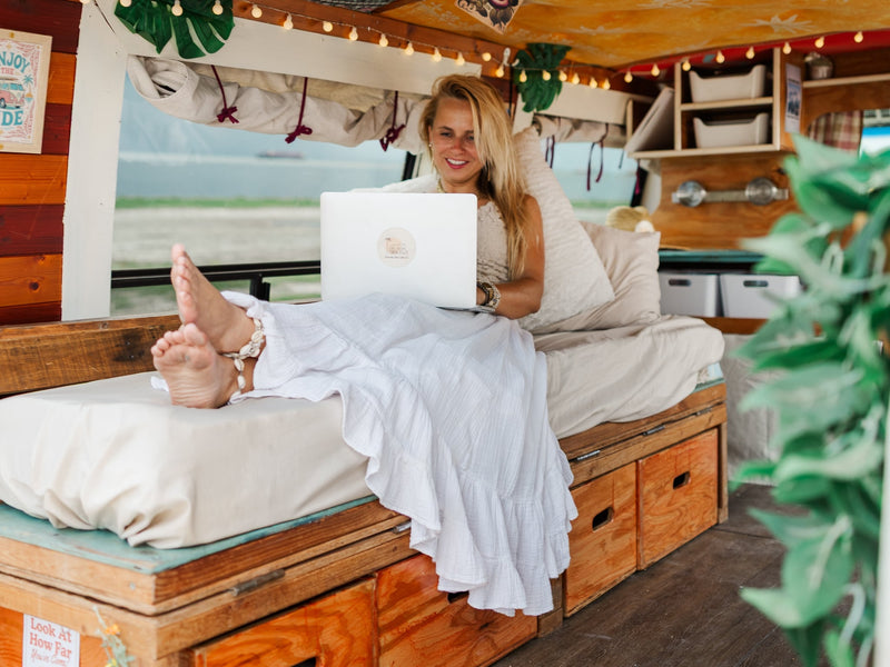  bohemian camper van interior with wooden bed — photo 12