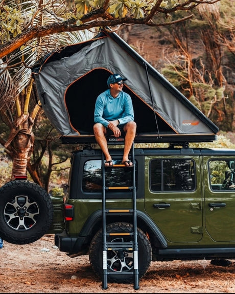  with a ladder for access. Consider this versatile RV rental for adventure.|Your RV rental includes essential camping kitchen gear: portable stove