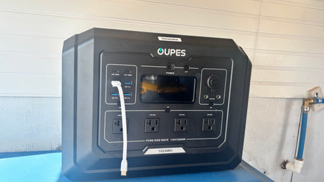 This OUPES portable power station, featuring USB-C, AC, and DC outlets, is ready for your RV rental or camping needs.