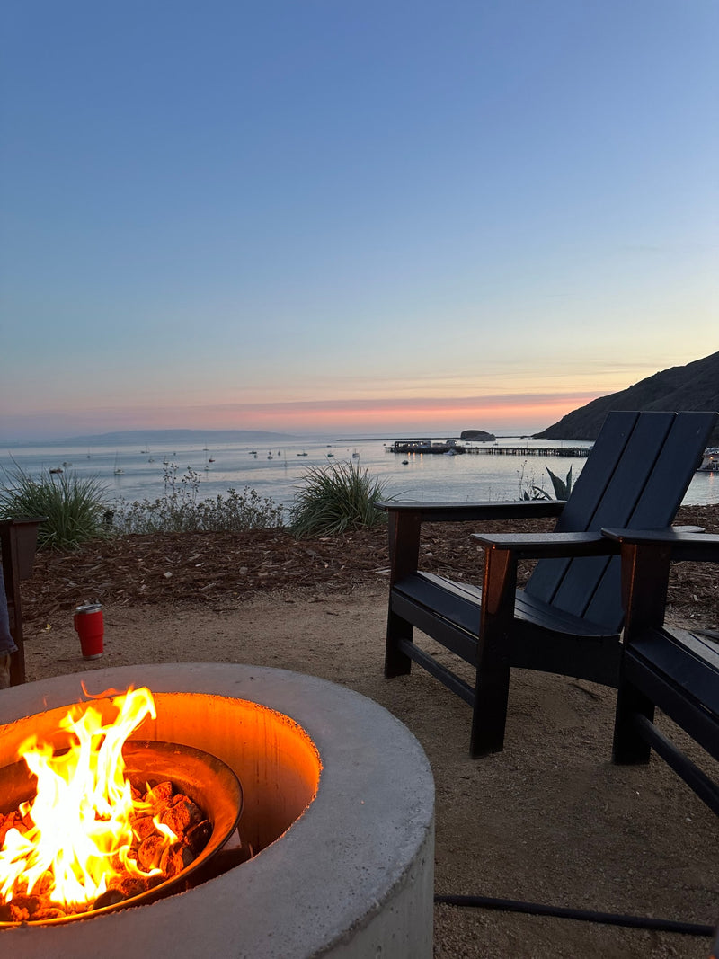 Cozy fire pit and stunning sunset ocean views. Ideal for a relaxing RV rental getaway experience. — photo 19