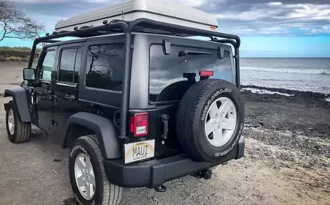 Maui 4x4 Jeep Wrangler Sahara Upgraded w/ Rooftot