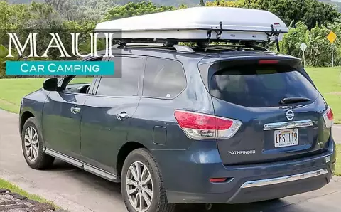 Blue AWD Nissan Pathfinder w/Rooftop Tent