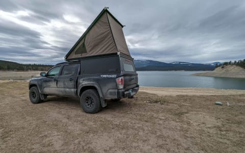 2021 Toyota Tacoma with Go Fast roof top Camper