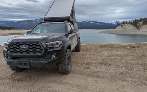 2021 Toyota Tacoma with Go Fast roof top Camper